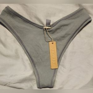 SKIMS cotton dipped thong in Pacific